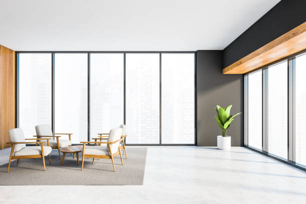 istock Gray and wooden office lounge with armchairs 1212558603
