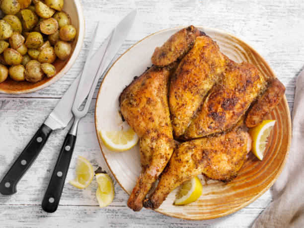 istock Roasted Spatchcock Lemon Chicken with Roasted Potatoes 1212559155
