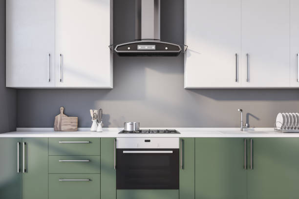 istock Gray kitchen interior with green countertops 1212559558