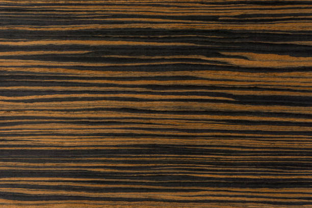 istock Ebony wood natural background and texture surface. 1212560145
