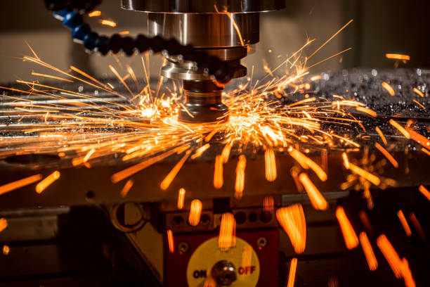 istock Metalworking CNC lathe milling machine. Cutting metal modern processing technology. 1212562555