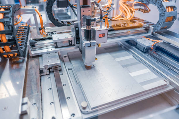 istock Metalworking CNC lathe milling machine. Cutting metal modern processing technology. 1212562559