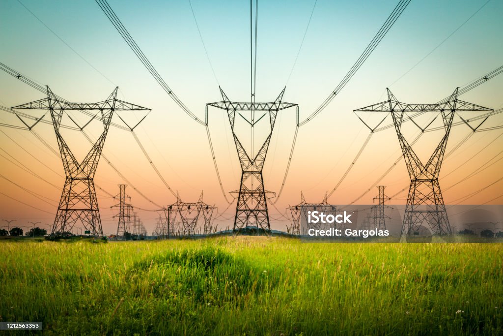 Power lines and sunset landscape Electricity Pylon, Rural Scene, Connection, Construction Industry, Electricity Power Line Stock Photo