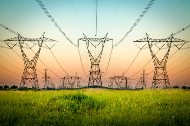 power lines and sunset landscape - electricity cables imagens e fotografias de stock