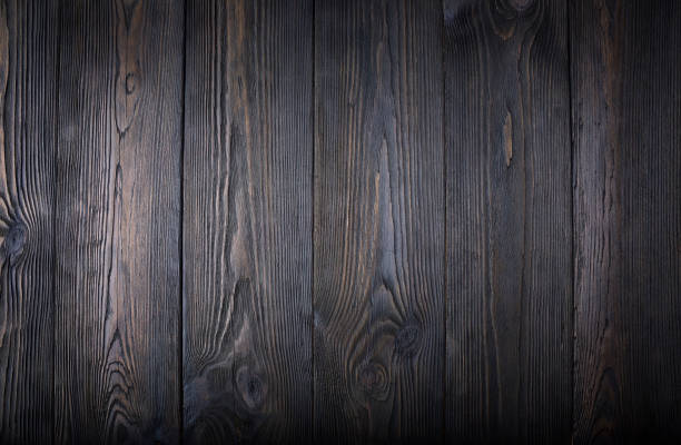 istock An old dark wooden table. Background 1212563357