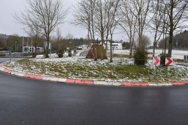 traffic circle near the entry to Nordschleife during Eifel winter with fresh snow 2020 nürburgring stock pictures, royalty-free photos & images