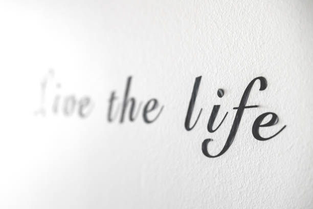istock Live the life word phrase on a white wall 1212565545