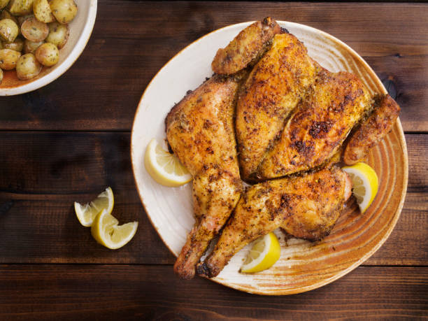 istock Roasted Spatchcock Lemon Chicken with Roasted Potatoes 1212567671