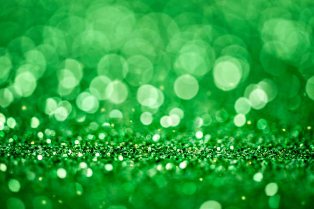 istock Green glitters. Green shiny abstract 1212569084