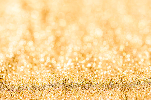 istock Gold abstract glitters. Color of gold texture 1212569155