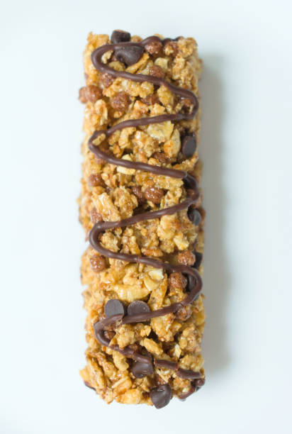 istock Granola bar with cereal and chocolate on a white background. 1212569782