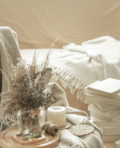 istock Home interior with books and dried flowers. 1212571229