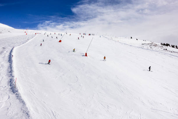 istock skiing in winter landscape 1212572378