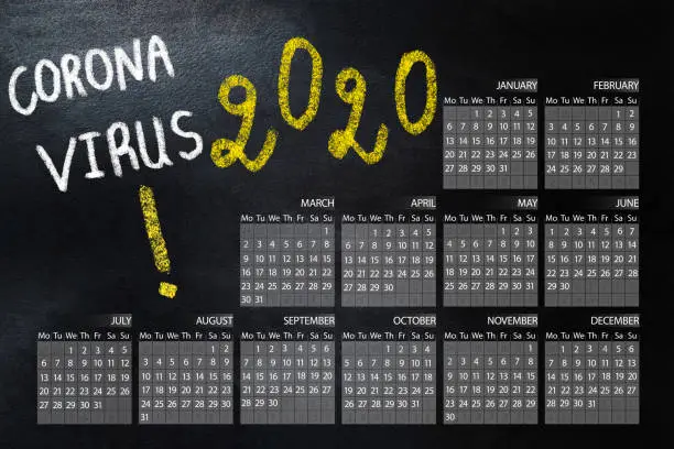 Photo of calendar 2020  with handwriting Novel coronavirus - 2019-nCoV, WUHAN virus concept.