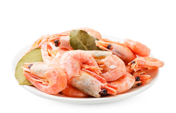 istock Cooked prawns with Bay leaf in a plate on a white background. Isolated 1212574009