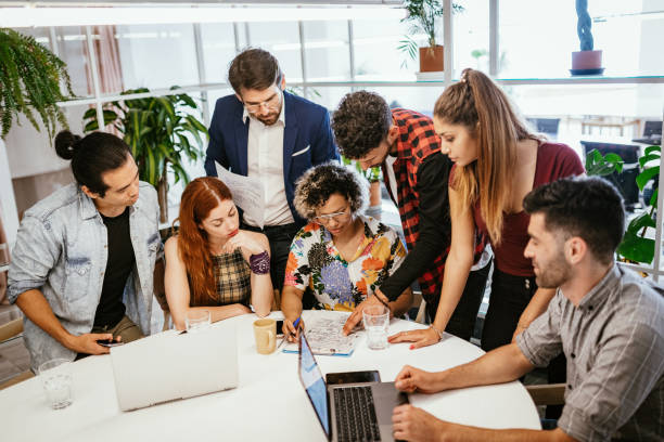 istock Entrepreneurs teamwork in green office 1212575033
