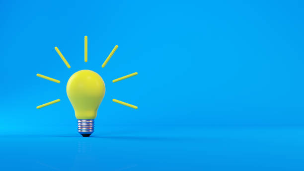 Yellow Light Bulb on Blue Background Yellow Light Bulb on Blue Background email campaign photos stock pictures, royalty-free photos & images