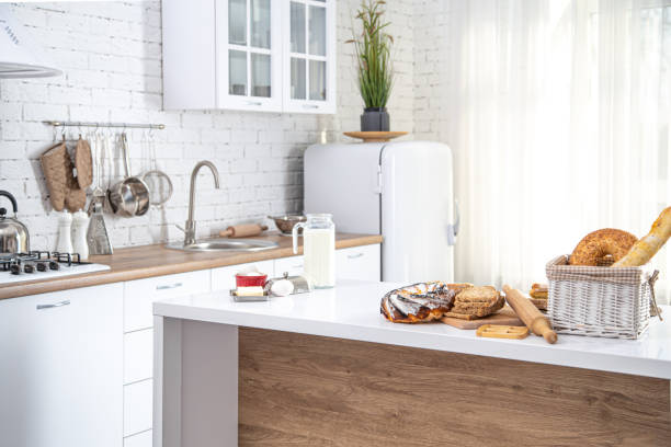 istock Home kitchen interior with fresh pastries on the table. 1212575455