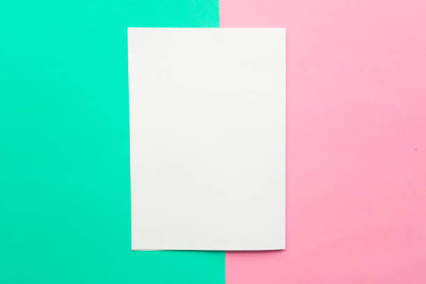 istock White mockup blank on pink and green pastel background. Copy space for the text. Minimal concept 1212577693