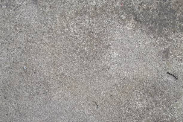 istock Concrete wall white and gray color for background. Old grunge textures with scratches and cracks. 1212577832