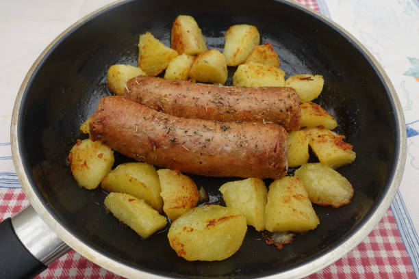 Fried sausage with potatoes  French cooking