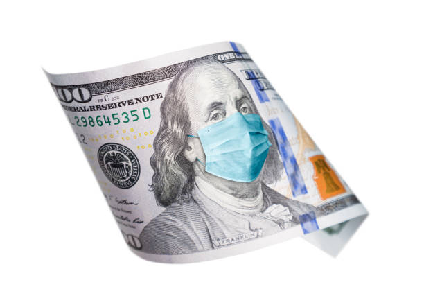 One Hundred Dollar Bill With Medical Face Mask on Benjamin Franklin Isolated on White One Hundred Dollar Bill With Medical Face Mask on Benjamin Franklin Isolated on White. benjamin franklin photos stock pictures, royalty-free photos & images