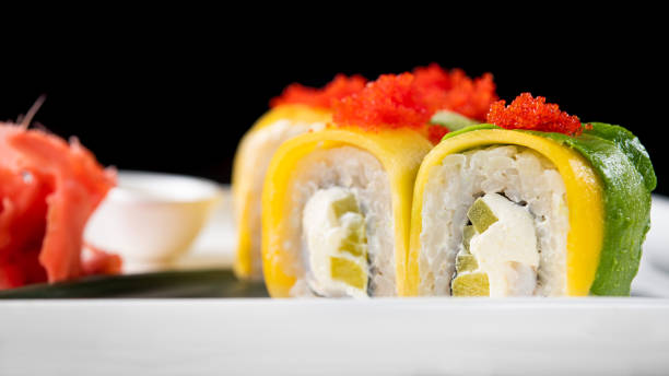 istock Closeup of sushi rolls 1212588090
