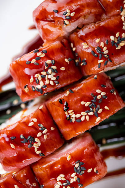 istock Closeup of sushi rolls 1212588128