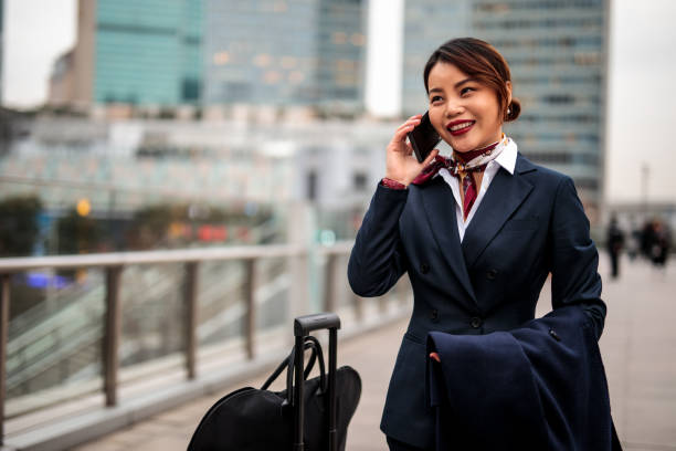 istock An elegant young woman coming back from travel 1212590044