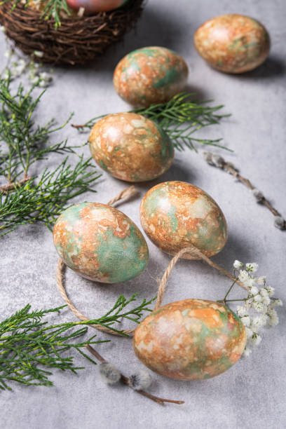 istock Marble color decoration Easter eggs with flowers 1212590317