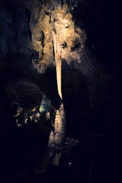 istock Stalactite and stalagmite Rock Formations close to forming a column, inside Carlsbad Carven New Mexico 1212590609
