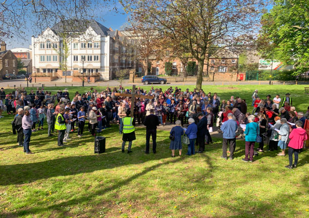 Christian people outdoors enjoying Methodist services London, England, UK - April 19, 2019: Group of religious Christian people outdoors enjoying spiritual Methodist services in springtime in Ealing Broadway eanling stock pictures, royalty-free photos & images