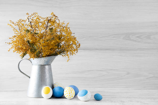 istock Easter Eggs and Bouquet of Flowers 1212595336