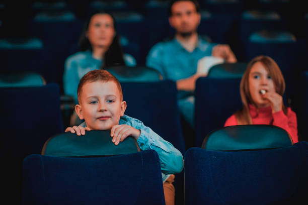 istock Family in the cinema 1212597752