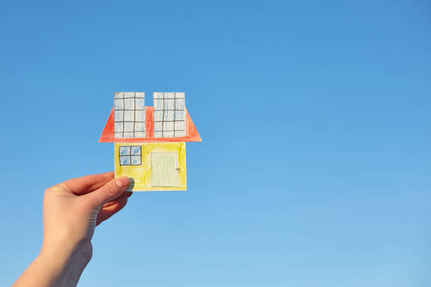 istock Children's painted hut with solar panels 1212598667