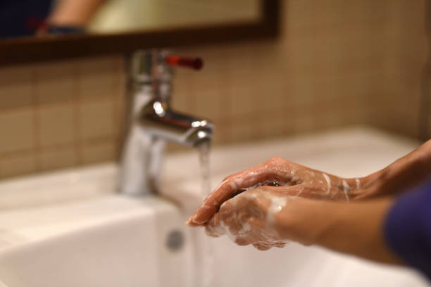 istock washing hands with soap against coronavirus 1212598965