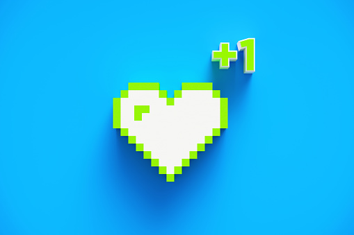 Pixelated green and white color heart shape and plus one on blue background. Horizontal composition with copy space.