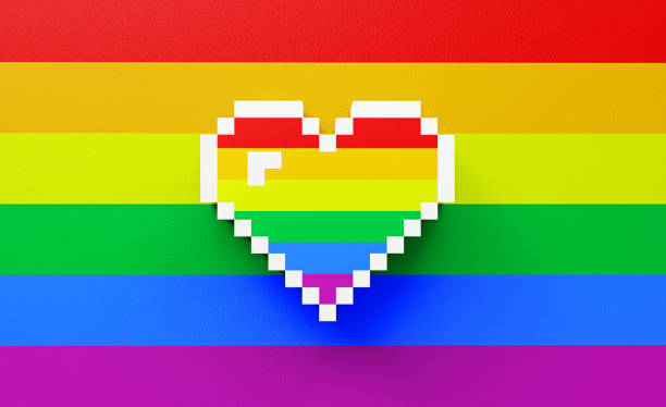Pixelated heart shape on rainbow background. Horizontal composition with copy space.
