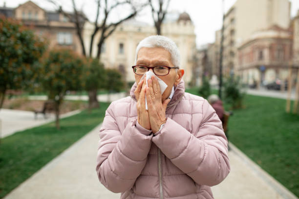 istock Senior woman with handkerchief 1212606492