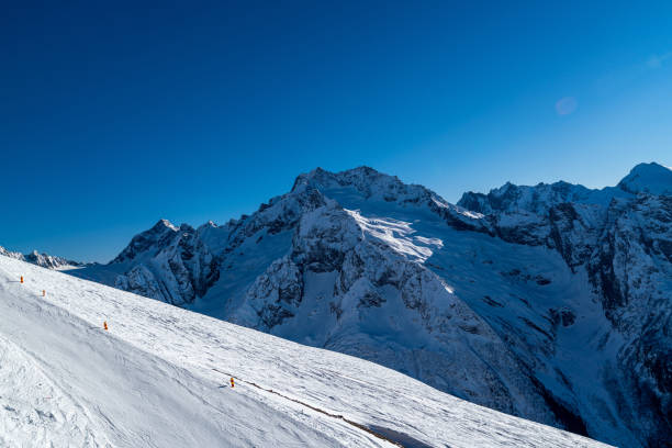 istock Ski Resort against majestic mountain peaks with snow 1212606563