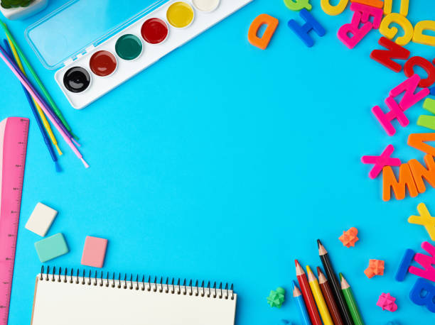 istock stationery school supplies for creativity and learning on a blue background 1212609476