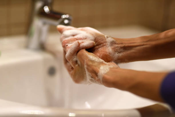 istock washing hands with soap against coronavirus 1212611171