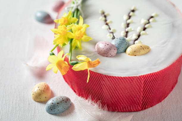 istock Homemade cake for Easter decorated with yellow daffodils 1212612164