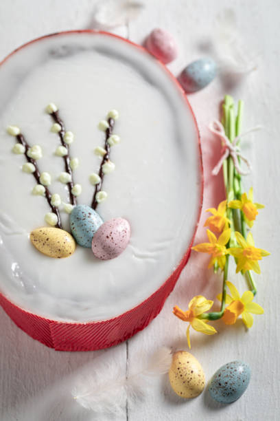 istock Sweet cake for Easter decorated with yellow daffodils 1212612219