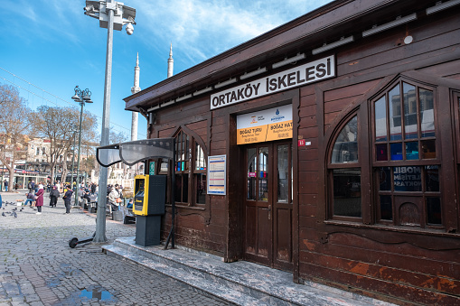 Ortakoy, Istanbul, Turkey - 02 March, 2020:  A view from Ortakoy ferry port in istanbul. Ortakoy (Ortaköy) is one of the famous tourist attraction spots in Besiktas district of Istanbul,