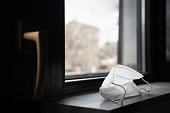 protection medical face mask by the window