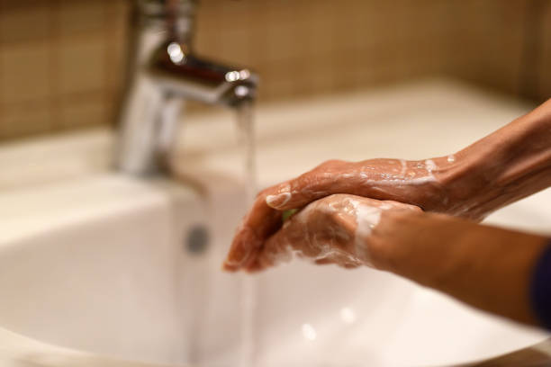 istock washing hands with soap against coronavirus 1212615647