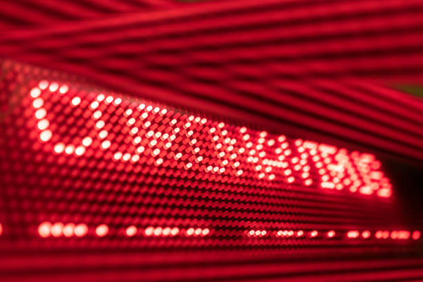 istock LED light sign with Corona Virus Alert 1212618730