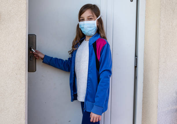 istock Beauty small girl wearing protective mask 1212620261