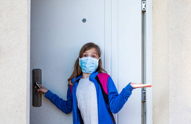 istock Beauty small girl wearing protective mask 1212620312